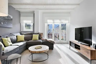 Una televisión o centro de entretenimiento en Luderna - Apartamento Cap de Aran A2