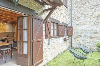 Un patio o zona al aire libre en Luderna - Apartamento con jardín Pleta de Arties Montardo