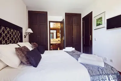 Cama o camas de una habitación en Luderna - Apartamento con terraza Bonaigua B2 Salient