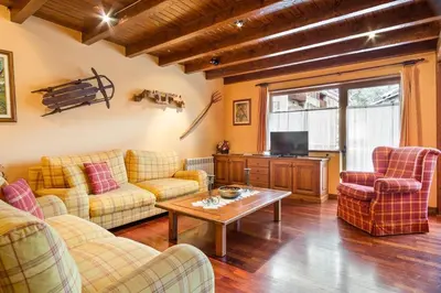 Una televisión o centro de entretenimiento en Luderna - Apartamento Tuca