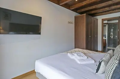 Cama o camas de una habitación en Luderna - Apartamento Val de Ruda A14 Montoliu