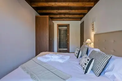 Cama o camas de una habitación en Luderna - Apartamento Val de Ruda A14 Montoliu