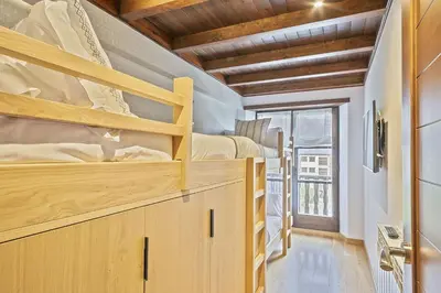 Cama o camas de una habitación en Luderna - Apartamento Val de Ruda A14 Montoliu