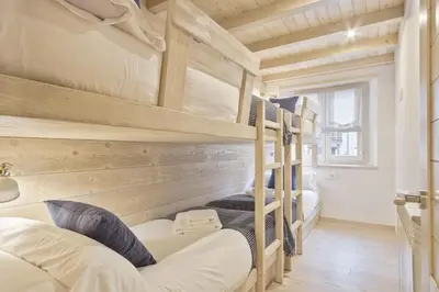 Cama o camas de una habitación en Luderna - Apartamento Val de Ruda A22 Montlude