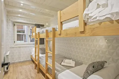 Cama o camas de una habitación en Luderna - Apartamento Val de Ruda A61 de Sarradé