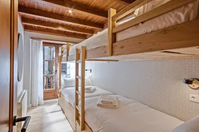 Cama o camas de una habitación en Luderna - Apartamento Val de Ruda A9 Peülla