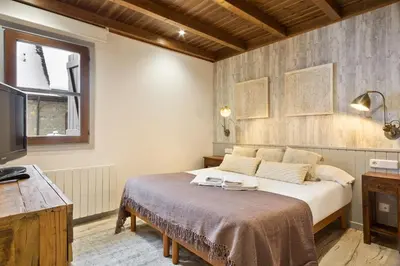 Cama o camas de una habitación en Luderna - Apartamento Val de Ruda B2 Pradets