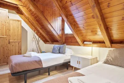 Cama o camas de una habitación en Luderna - Casa con jardín Vista Aneto