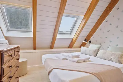 Cama o camas de una habitación en Luderna - Dúplex Cap de Aran D3