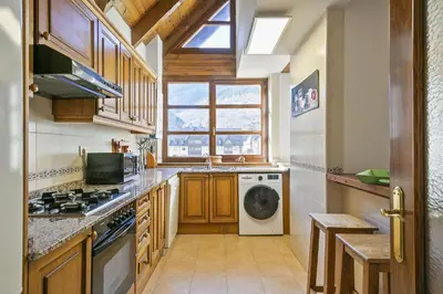 Una cocina o zona de cocina en Luderna - Dúplex Comets 4J