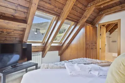 Cama o camas de una habitación en Luderna - Dúplex Val de Ruda C12 Tuc der Òme