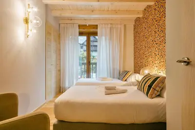 Cama o camas de una habitación en Luderna - Tríplex Tuc dera Salana