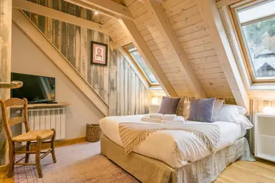 Cama o camas de una habitación en Luderna - Tríplex Tuc dera Salana