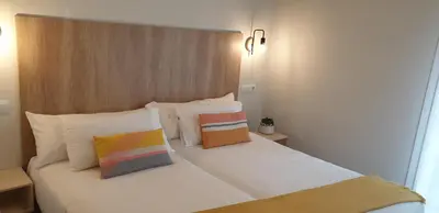 Cama o camas de una habitación en Apartamento Vive Ainsa