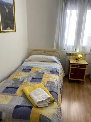 Cama o camas de una habitación en Hostal Casiano Camarasa