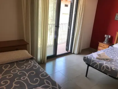 Cama o camas de una habitación en Apartaments Ca L'Albert