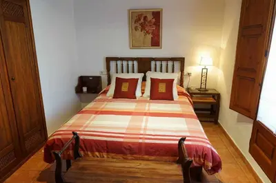 Cama o camas de una habitación en Casa rural con mucho encanto, en un entorno mágico
