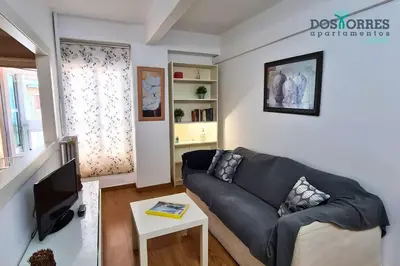 Una televisión o centro de entretenimiento en Dos Torres Légolas - Parking privado