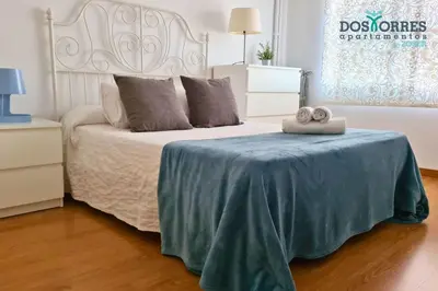 Cama o camas de una habitación en Dos Torres Légolas - Parking privado