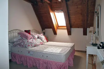 Cama o camas de una habitación en Salardu centro atico duplex NA