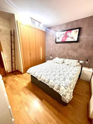 Cama o camas de una habitación en APARTAMENTO L AÜT