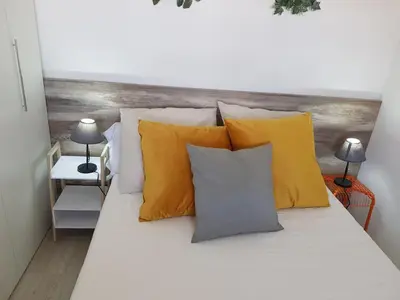 Cama o camas de una habitación en Atico la casa de Tudela