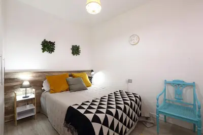 Cama o camas de una habitación en Atico la casa de Tudela