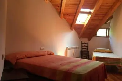 Cama o camas de una habitación en Casa Pirineu