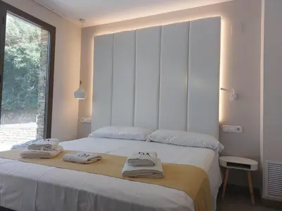 Cama o camas de una habitación en Apartamentos Ordesa Ainsa