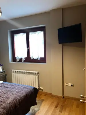 Cama o camas de una habitación en Acogedor apartamento en el corazón del Valle