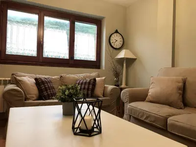 Zona de estar de Acogedor apartamento en el corazón del Valle