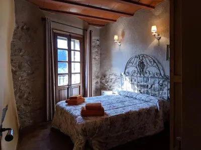 Cama o camas de una habitación en L'Acadèmia de La Vilella Baixa