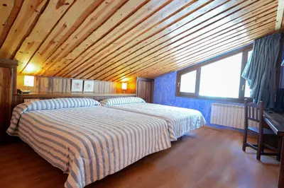 Cama o camas de una habitación en HOTEL TURPÍ