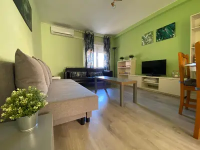 Una televisión o centro de entretenimiento en Dos Torres Frodo - Parking privado gratis