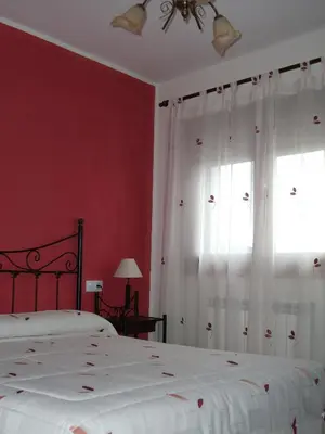 Cama o camas de una habitación en Apartamentos Arcos de Solana