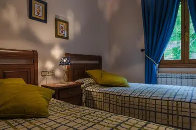 Cama o camas de una habitación en Casa Martin Ordesa