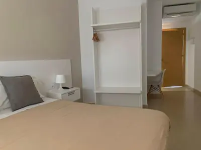 Cama o camas de una habitación en Hostal La Placeta