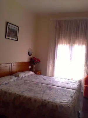 Cama o camas de una habitación en Hostal Can Josep