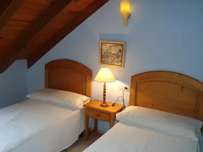Cama o camas de una habitación en Apartamentos Saila