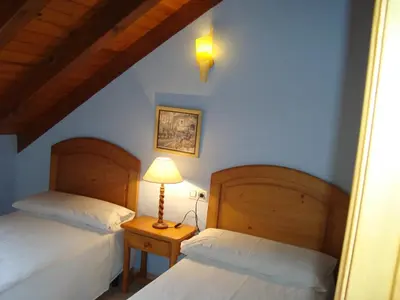 Cama o camas de una habitación en Apartamentos Saila