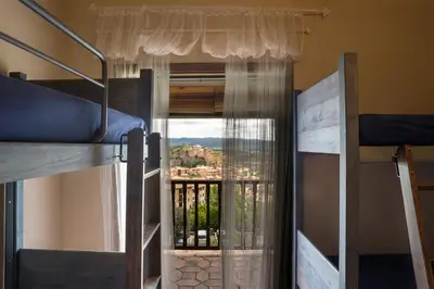 Litera o literas de una habitación en Albergue Rural de Guara