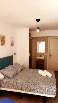 Cama o camas de una habitación en Pensión La Estrella