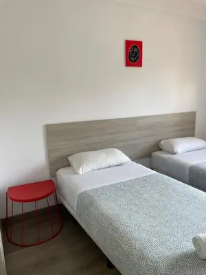 Cama o camas de una habitación en Pensión La Estrella
