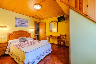 Cama o camas de una habitación en Hostal Pañart