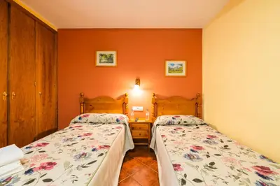 Cama o camas de una habitación en Hostal Pañart