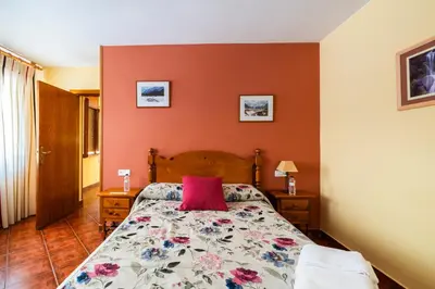 Cama o camas de una habitación en Hostal Pañart