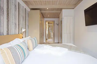 Cama o camas de una habitación en Luderna - Apartamento Val de Ruda A30 Manaud