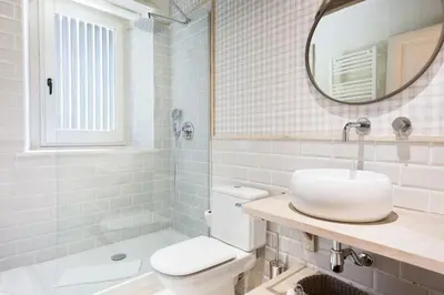 Un baño de Luderna - Dúplex con jardín des Treuetes