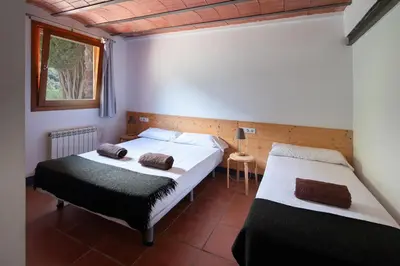 Cama o camas de una habitación en Mas Corbella