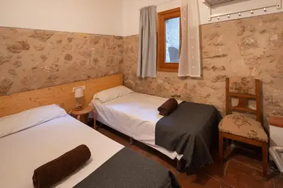 Cama o camas de una habitación en Mas Corbella